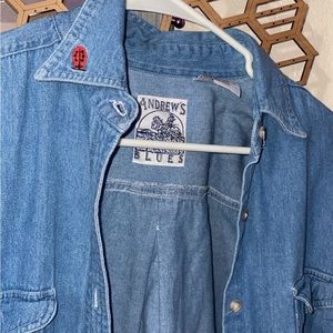 Denim light blue “jacket”. Brand is Andrew’s Blues and size is a small